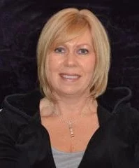 Lesley, a fully qualified reflexologist and a member of the Association of Reflexologists